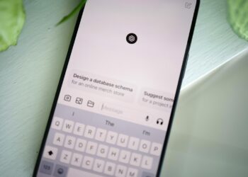 a close up of a cell phone on a table