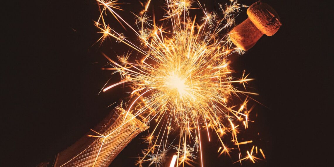 yellow fireworks in the sky during nighttime