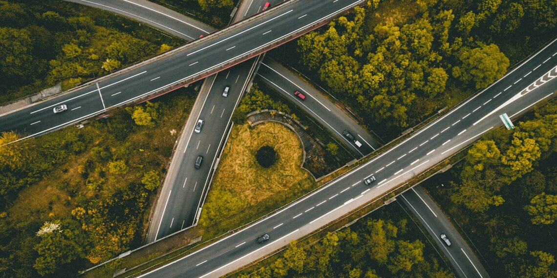 aerial photography of interlocking freeways with travelling cars