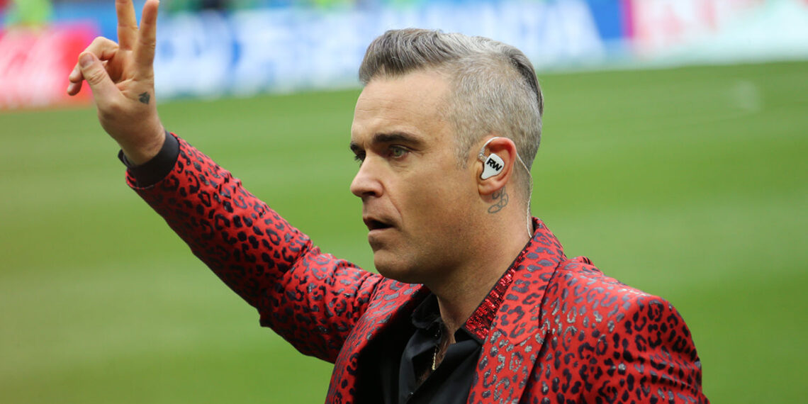Robbie Williams sumindė The Beatles rekordą: britų topuose – istorinis lūžis, kurio niekas nesitikėjo